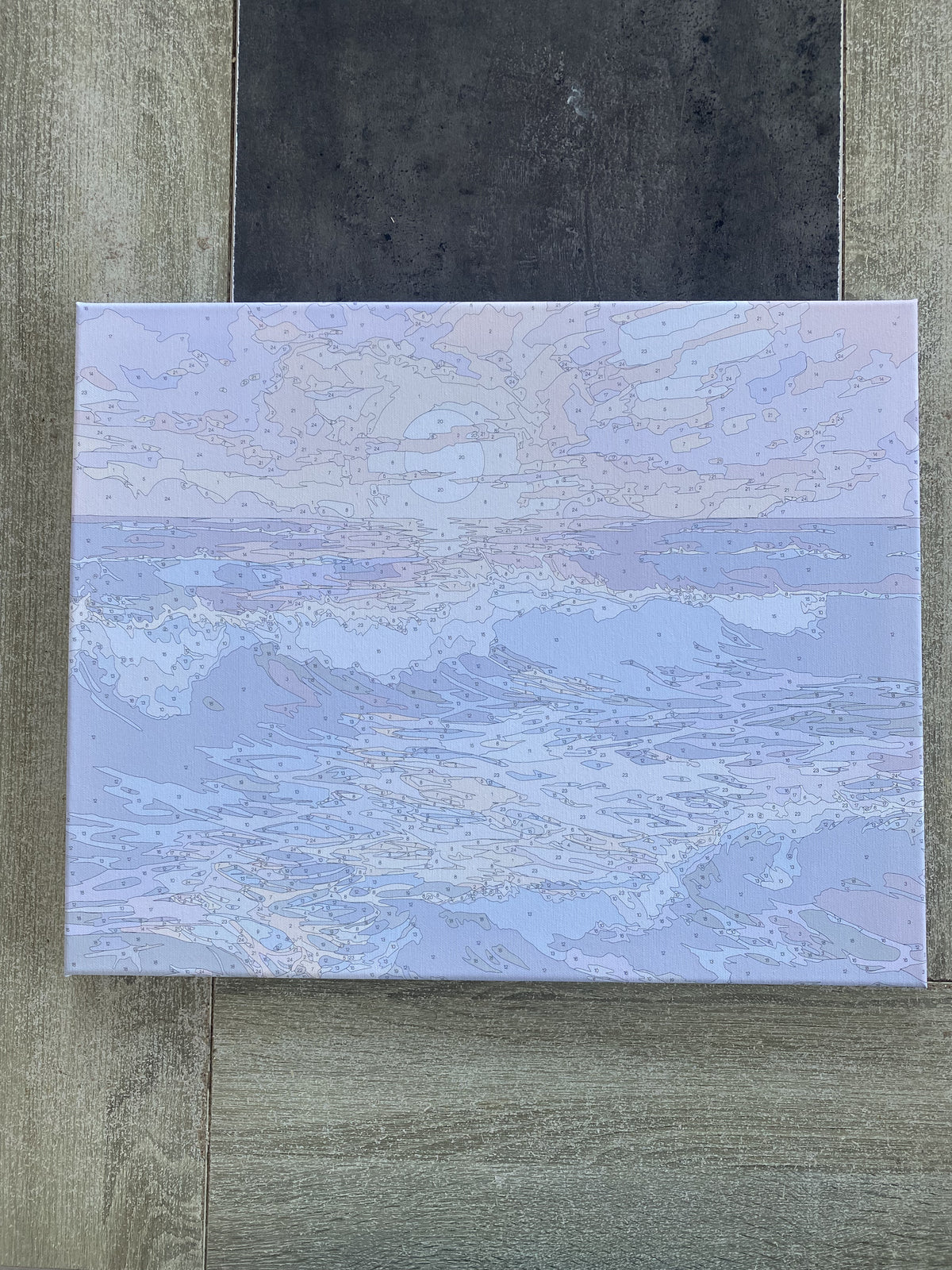 Toile numérotée d’un coucher de soleil sur la mer, avant de peindre